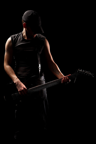Man playing on guitar - Фото, изображение