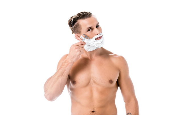 sexy shirtless man with foam on face shaving isolated on white - Photo, Image