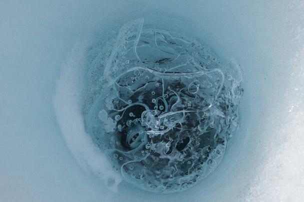 Cryoconite hole in the glacier of Antarctica - Foto, Imagen