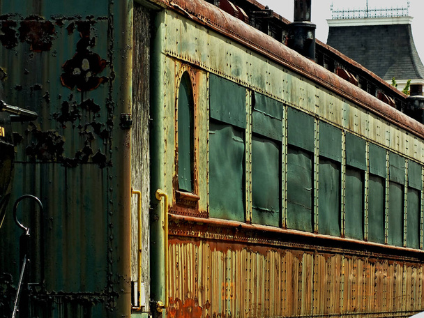 An abandoned rusting railroad train coach car - Fotó, kép