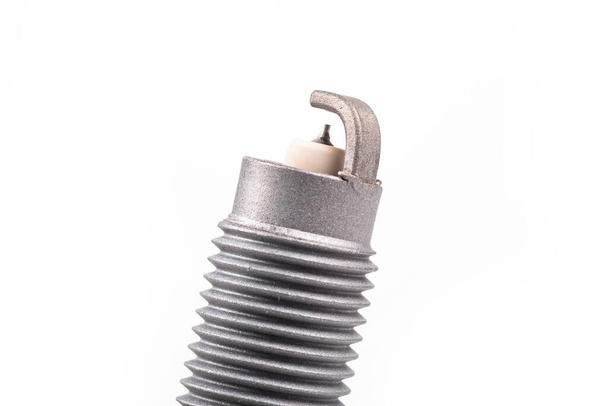 Studio lighting. spark plug from a gasoline engine. It is matte. Close-up - Photo, Image