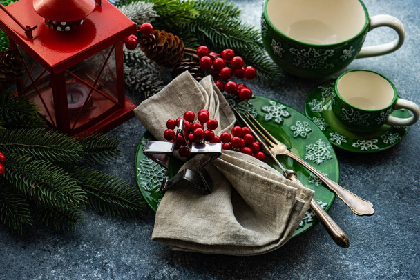 Holiday table setting for Christmas dinner on concrete table - Photo, Image