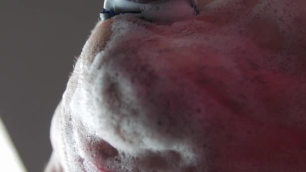 Hombre afeita la cara - Metraje, vídeo