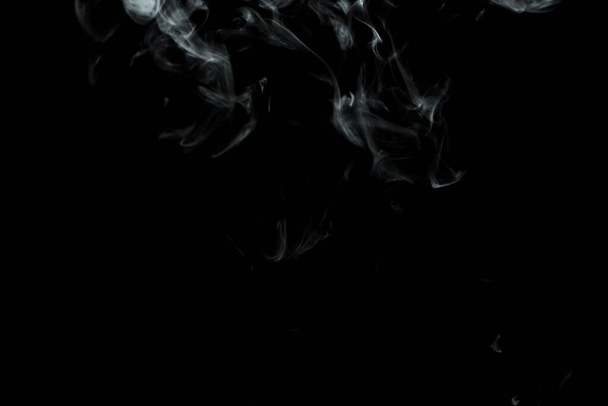 Abstract powder or smoke effect isolated on black background,Out of focus - Zdjęcie, obraz