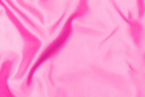 Texture en tissu satiné rose plastique fond flou doux - Photo, image