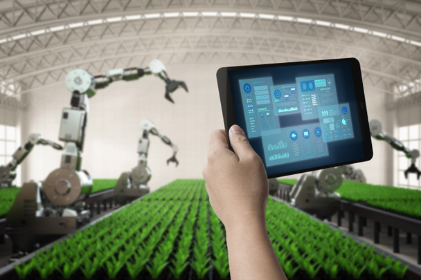 Concept de technologie agricole avec contrôle humain Bras robotique de rendu 3d avec tablette numérique en serre - Photo, image