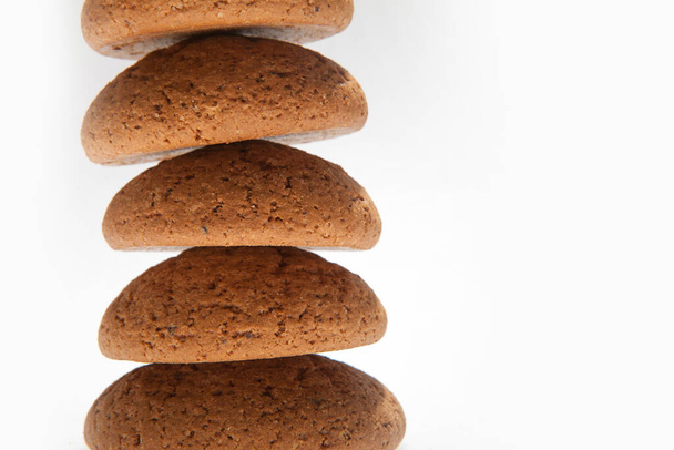 A stack of oatmeal cookies. White blank for text. Advertising design - 写真・画像