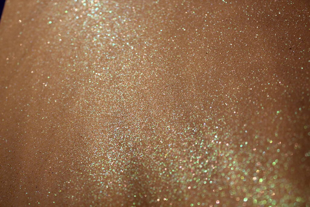 glitter sparkle gold iridescent background with copy space  - Photo, Image