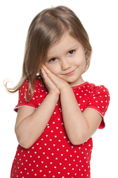 Shy preschool girl against the white - Фото, изображение