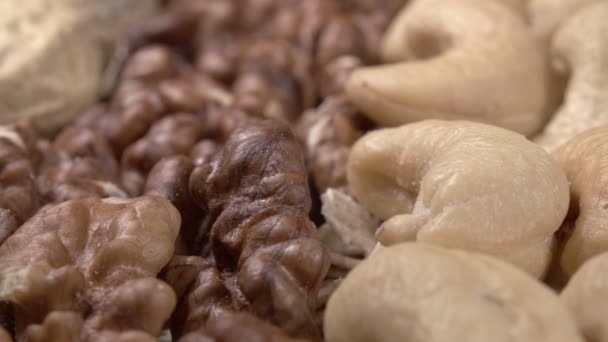 Nuts and oatmeal close-up. Extreme macro. - Footage, Video