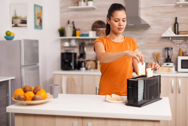 Bread toaster in kitchen - Foto, imagen