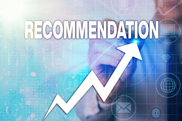 Writing note showing Recommendation. Business photo showcasing something that recommends or expresses commendation Arrow symbol going upward showing significant achievement. - Photo, Image
