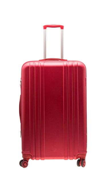 red suitcase isolated on white background - 写真・画像