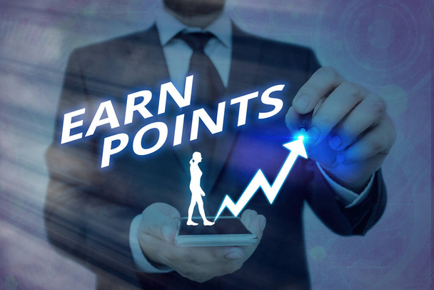 Writing note showing Earn Points. Business photo showcasing getting praise or approval for something you have done Arrow symbol going upward showing significant achievement. - Photo, Image