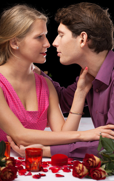 Romantic dinner holding and kissing - Zdjęcie, obraz