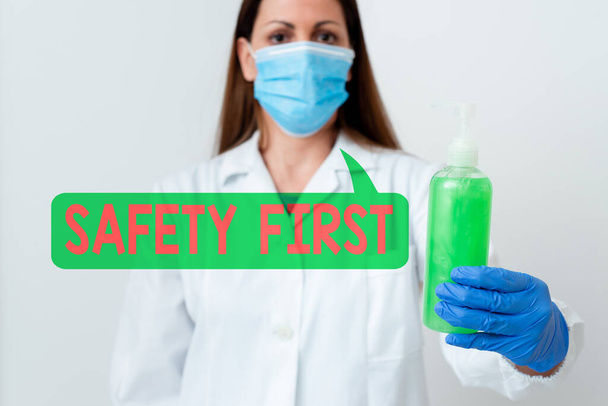Word writing text Safety First. Business concept for Avoid any unnecessary risk Live Safely Be Careful Pay attention Laboratory blood test sample shown for medical diagnostic analysis result. - 写真・画像