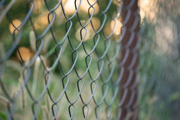 Metal mesh as a fence and enclosure - Photo, image