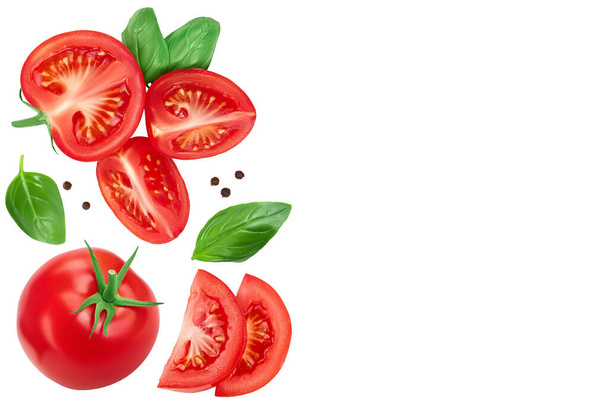 Tomato slices with basil and peppercorns isolated on white background. Clipping path. Top view with copy space for your text. Flat lay - Fotó, kép