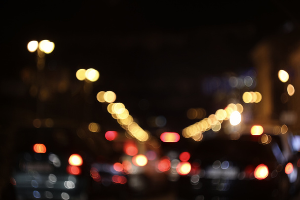 Desenfoque de luces de la ciudad nocturna para ser utilizado como imagen de fondo. - Foto, imagen