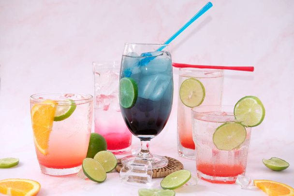 colorful cocktails in glass on white background, close-up. space for text - Photo, image