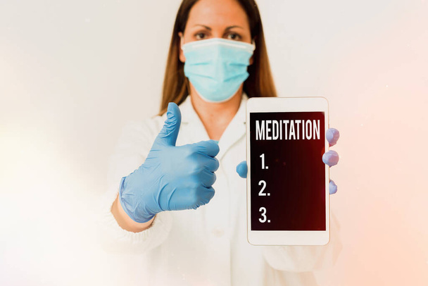 Conceptual hand writing showing Meditation. Business photo showcasing the discourse intended to express its author s is reflections Laboratory technician featuring paper accessories smartphone. - Photo, Image