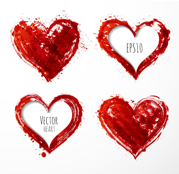 Set of grunge paper-cut hearts. - Vector, imagen