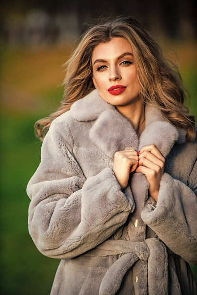 apparel for european winter. elegant woman wear fur coat. stylish lady wear faux fur. Versatile Textures. fashion and beauty. successful businesswoman in outdoor. autumn female outfit - Fotó, kép