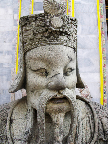 Bangkok, Thailand, January 25, 2013: Face of a sculpture in the Royal Palace in Bangkok - Photo, Image