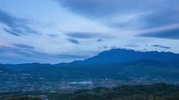 Time lapse sunrise MOUNT KINABALU, moving clouds over a villages. Taken at RANAU, SABAH, BORNEO. - Footage, Video