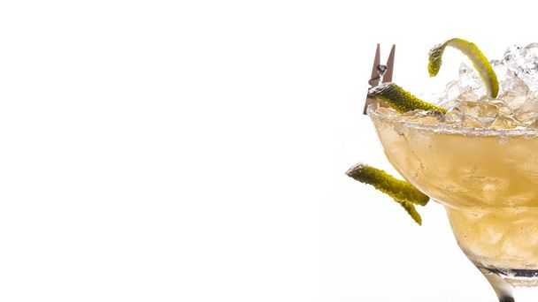 Alcoholic, non-alcoholic yellow cocktail with ice on white background - Foto, Imagem
