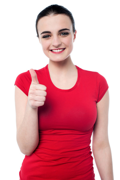 Girl showing thumbs up - 写真・画像