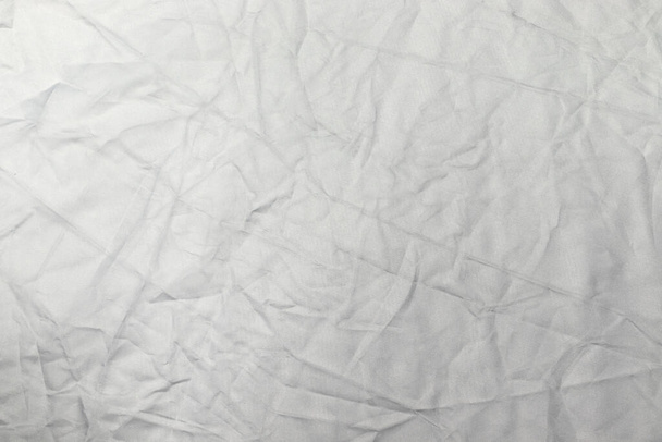 Tissu froissé blanc texture fond. - Photo, image