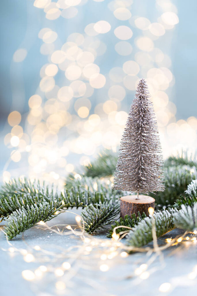 Christmas spruce with tree and blurred shiny lights. - Zdjęcie, obraz