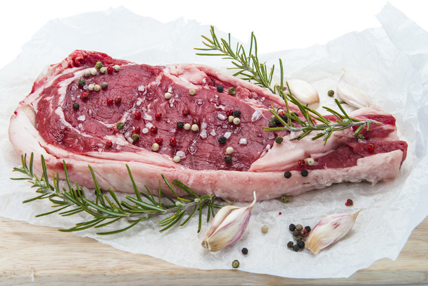 T-bone steak isolated over white - Фото, изображение