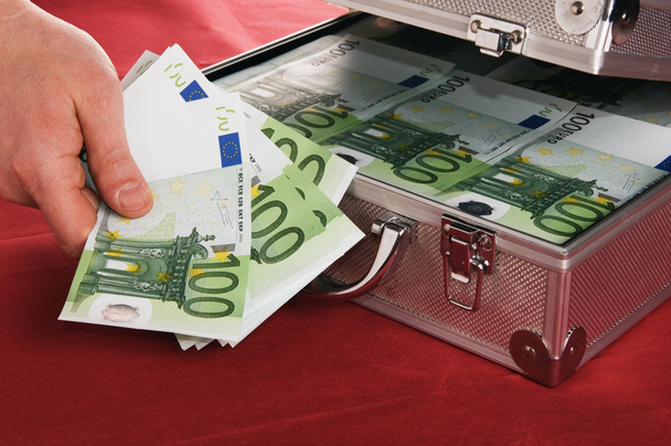 Suitcase with money - Foto, imagen