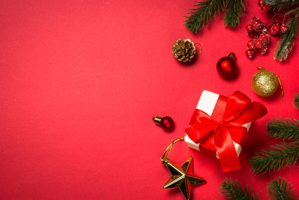 Christmas flat lay background with fir tree and decorations. - Zdjęcie, obraz