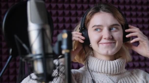 Young singer woman during music session at recording studio. - Footage, Video