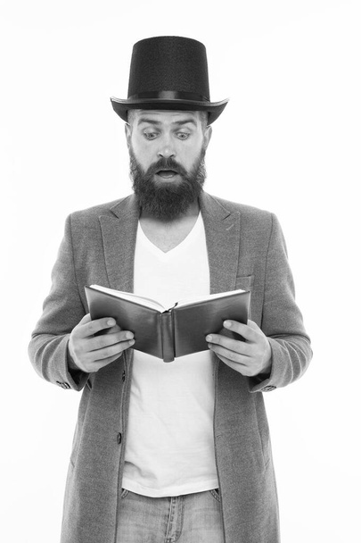 Reading dramatic scenario. Bearded man read book isolated on white. Poetry reading. Inspirational book. Literature teacher. Books shop. Interesting story. Guy classic outfit read book. Dramatic look - Фото, зображення