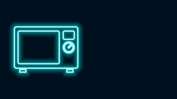 Zářící neonová linka Mikrovlnná trouba ikona izolované na černém pozadí. Ikona domácích spotřebičů. Grafická animace pohybu videa 4K - Záběry, video