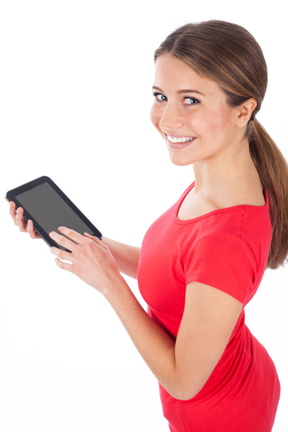 Young woman using electronic tablet - Foto, imagen
