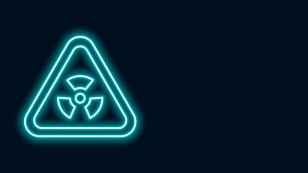 Signo triangular de línea de neón brillante con icono de símbolo de radiación aislado sobre fondo negro. Animación gráfica de vídeo 4K - Imágenes, Vídeo