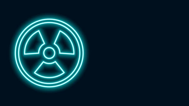 Zářící neonová čára Radioaktivní ikona izolovaná na černém pozadí. Radioaktivní toxický symbol. Značka radiačního rizika. Grafická animace pohybu videa 4K - Záběry, video