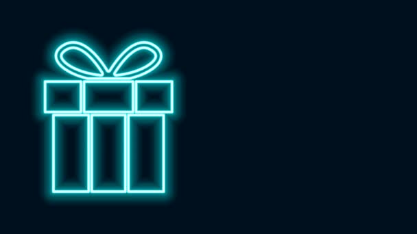 Parlayan neon hattı hediye kutusu simgesi siyah arkaplanda izole edildi. Doğum günün kutlu olsun. 4K Video hareketli grafik canlandırması - Video, Çekim