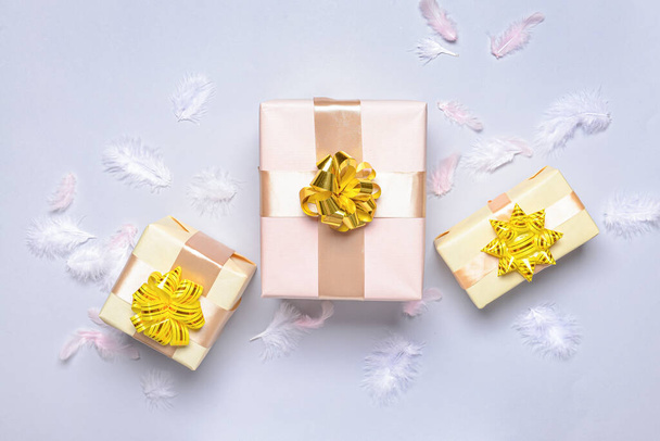 Beautiful Christmas gift boxes on light background - Photo, Image