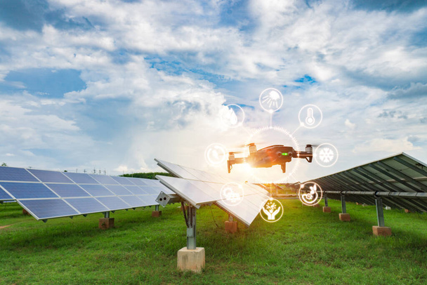 Engineers use the IR Scanner installed on the drone for use in flight, check the performance of solar cells and detect hot spots that are a cause of short circuit and equipment damage(AI technology). - Photo, Image