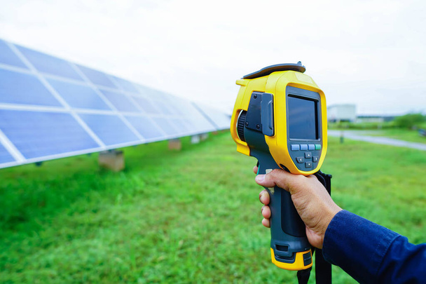 Thermoscan(thermal image camera), Scan to the equipment for a temperature check, and this concept used to check the temperature of the Solar panel. - Photo, Image
