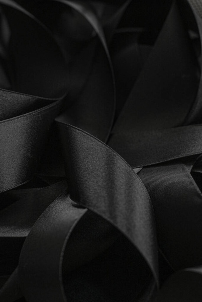 Black silk ribbon as background, abstract and luxury brand design - Foto, immagini