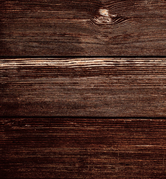 vertical lined wooden panels. Aged and shabby weather- beaten wood. Natural texture and wood background with space for text - Foto, imagen