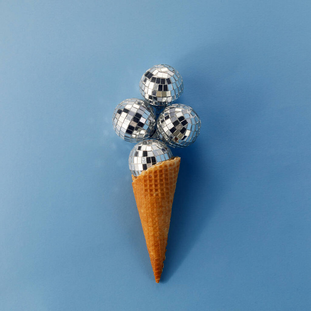 Disco balls ice cream on blue background. Flat lay. - Zdjęcie, obraz