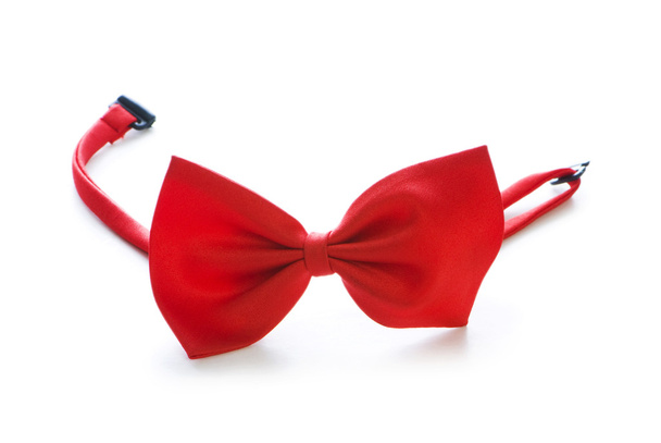 Красный галстук бабочка изолирован на белом
 - Фото, изображение